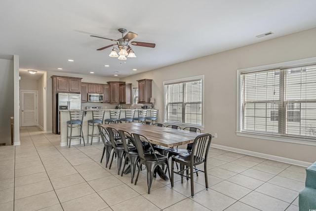 703 37th Ave S, North Myrtle Beach, SC 29582 - dining space featuring a ceiling fan, light tile patterned floors, baseboards, and recessed lighting