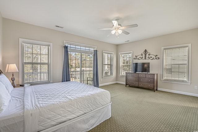 703 37th Ave S, North Myrtle Beach, SC 29582 - carpeted bedroom with baseboards and a ceiling fan