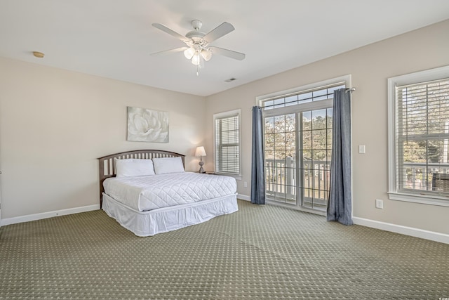 703 37th Ave S, North Myrtle Beach, SC 29582 - carpeted bedroom featuring baseboards, access to outside, and a ceiling fan