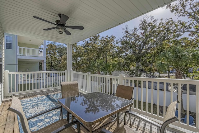 703 37th Ave S, North Myrtle Beach, SC 29582 - wooden deck with ceiling fan and outdoor dining area