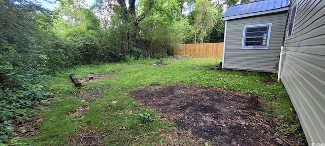 view of yard featuring fence