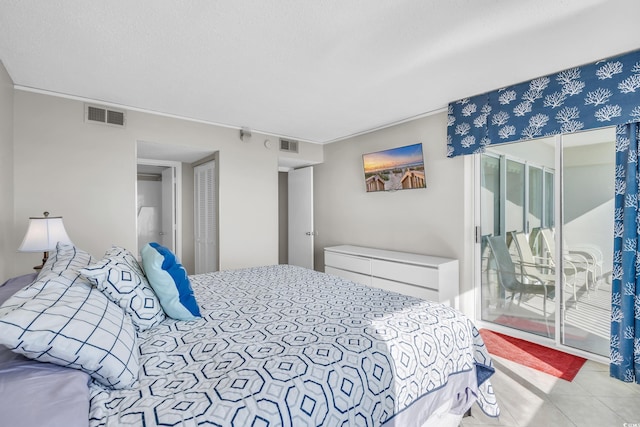 5806 N Ocean Blvd Unit 203, North Myrtle Beach, SC 29582 - bedroom with access to outside and tile patterned floors
