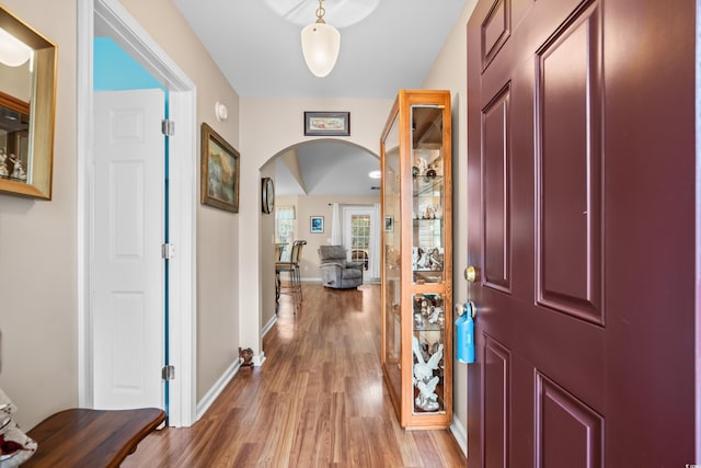 6478 Royal Pine Dr, Myrtle Beach, SC 29588 - entryway featuring arched walkways, light wood-style floors, and baseboards