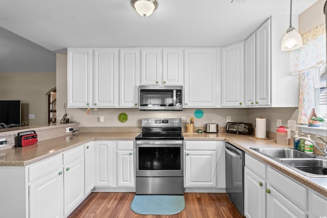 6478 Royal Pine Dr, Myrtle Beach, SC 29588 - kitchen featuring stainless steel appliances, a sink, white cabinets, and light wood-style flooring