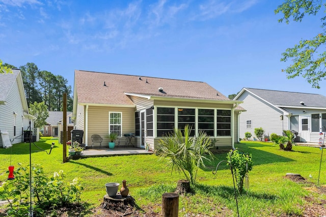 6478 Royal Pine Dr, Myrtle Beach, SC 29588 - back of property featuring a patio, a sunroom, and a lawn