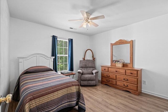 6478 Royal Pine Dr, Myrtle Beach, SC 29588 - bedroom featuring light wood-type flooring, a ceiling fan, and baseboards