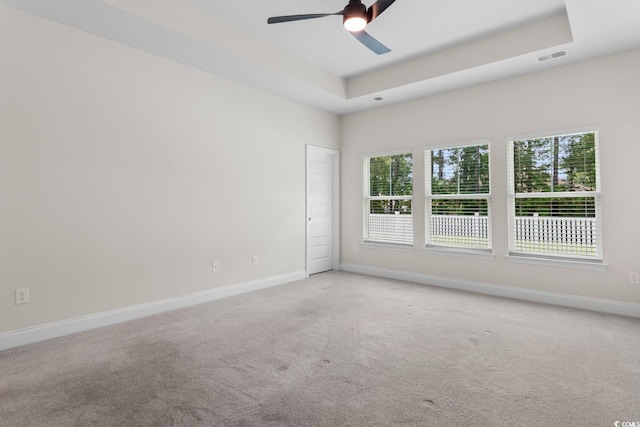 739 Harrison Mill St, Myrtle Beach, SC 29579 - empty room with baseboards, ceiling fan, carpet flooring, and a tray ceiling