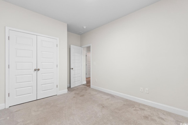 739 Harrison Mill St, Myrtle Beach, SC 29579 - unfurnished bedroom featuring carpet, baseboards, and a closet