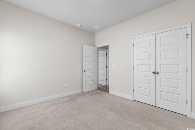 739 Harrison Mill St, Myrtle Beach, SC 29579 - unfurnished bedroom with carpet floors, baseboards, and a closet