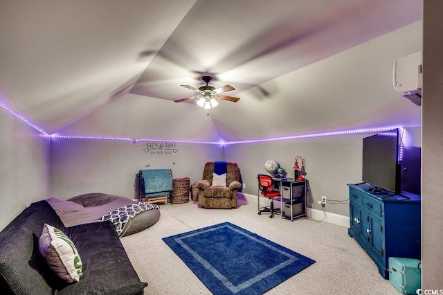 carpeted living area with an AC wall unit, vaulted ceiling, and a ceiling fan