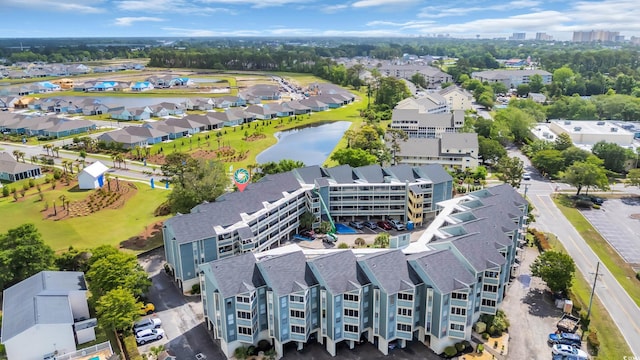 aerial perspective of suburban area featuring a large body of water