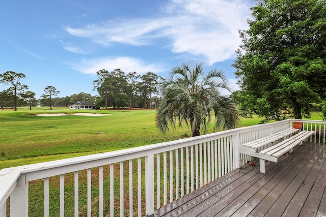 deck featuring a yard