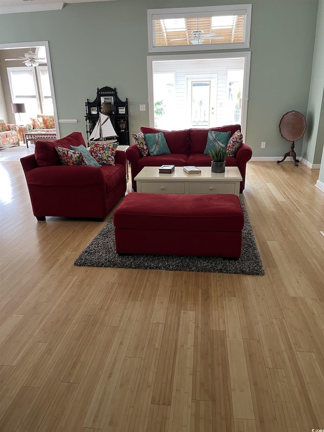 3012 Winding River Rd, North Myrtle Beach, SC 29582 - living room featuring light wood-type flooring, baseboards, and ceiling fan