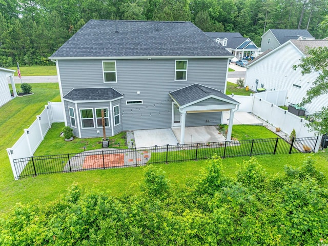 395 Dunbarton Ln, Conway, SC 29526 - rear view of property featuring a patio area, a shingled roof, and concrete driveway