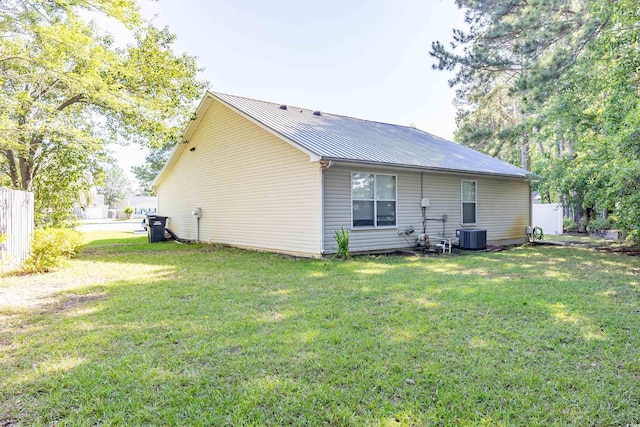 9664 Middleton Ct, Murrells Inlet, SC 29576 - rear view of property featuring metal roof and a lawn