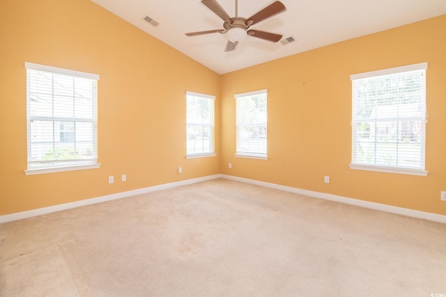 111 Rose Water Loop, Myrtle Beach, SC 29588 - empty room with a ceiling fan, light colored carpet, vaulted ceiling, and healthy amount of natural light