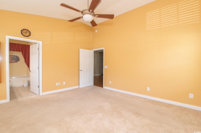 111 Rose Water Loop, Myrtle Beach, SC 29588 - unfurnished bedroom featuring light carpet, high vaulted ceiling, connected bathroom, and ceiling fan