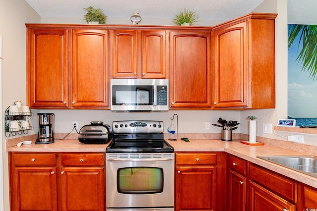 111 Rose Water Loop, Myrtle Beach, SC 29588 - kitchen with appliances with stainless steel finishes and light countertops