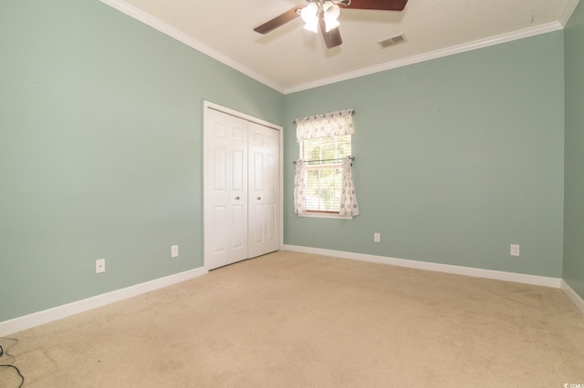 111 Rose Water Loop, Myrtle Beach, SC 29588 - unfurnished bedroom featuring carpet, crown molding, a closet, and ceiling fan