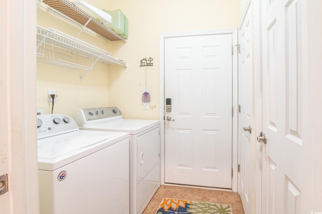 111 Rose Water Loop, Myrtle Beach, SC 29588 - laundry room with washing machine and dryer and light tile patterned floors