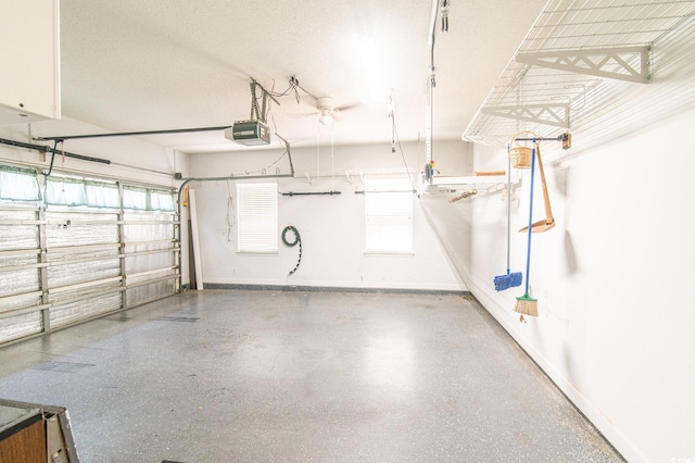 111 Rose Water Loop, Myrtle Beach, SC 29588 - garage featuring a garage door opener and baseboards