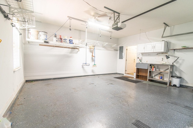 111 Rose Water Loop, Myrtle Beach, SC 29588 - garage with a garage door opener and electric panel