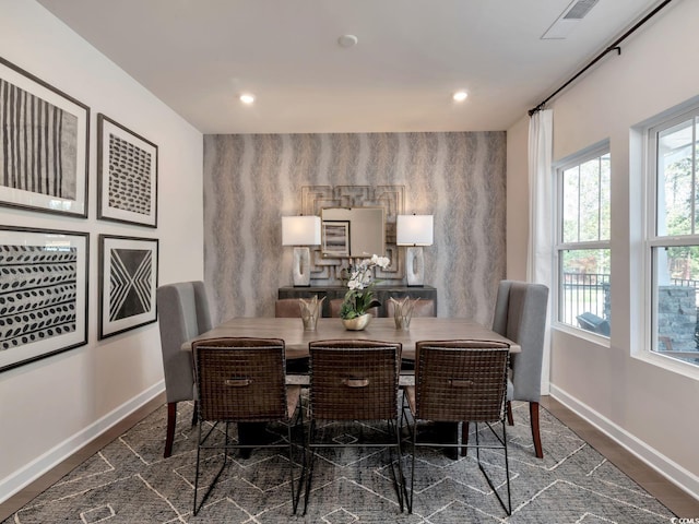 4861 Hopespring St, Myrtle Beach, SC 29579 - dining area with baseboards, an accent wall, and recessed lighting