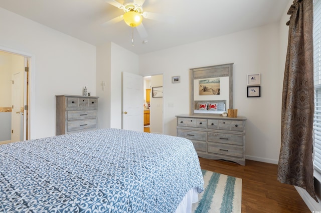 bedroom with wood finished floors, baseboards, and a ceiling fan