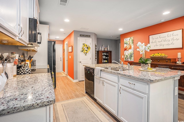 2016 Willow Run Dr Unit B, Little River, SC 29566 - kitchen featuring black appliances, white cabinets, a sink, recessed lighting, and light wood-style floors