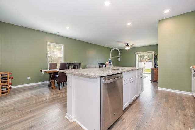 787 Dusty Pine Way, Myrtle Beach, SC 29588 - kitchen with dishwasher, a sink, light wood-type flooring, white cabinetry, and a center island with sink