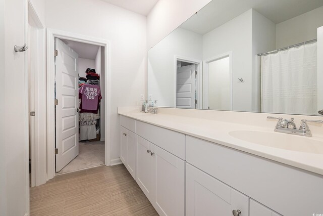 787 Dusty Pine Way, Myrtle Beach, SC 29588 - bathroom featuring vanity and a walk in closet