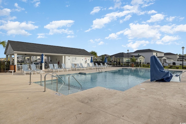 787 Dusty Pine Way, Myrtle Beach, SC 29588 - community pool with a patio and a residential view