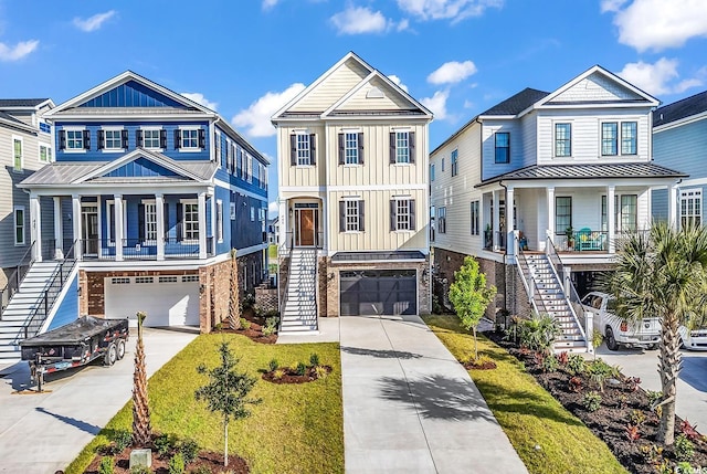 441 Saint Julian Ln, Myrtle Beach, SC 29579 - raised beach house featuring stairway, a porch, board and batten siding, and an attached garage