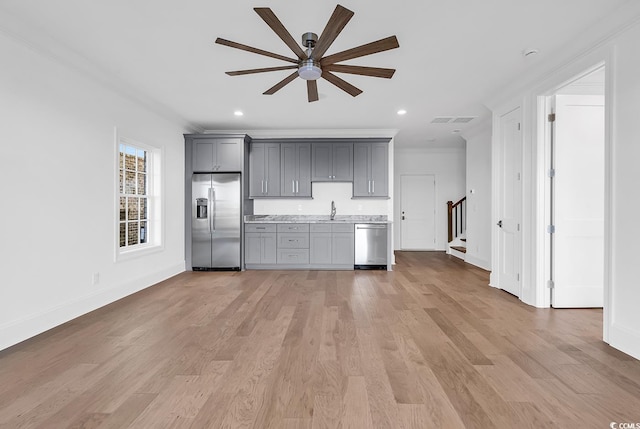 441 Saint Julian Ln, Myrtle Beach, SC 29579 - kitchen featuring appliances with stainless steel finishes, gray cabinetry, a sink, ceiling fan, and light countertops