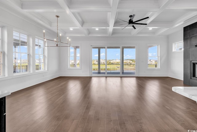 437 Saint Julian Ln, Myrtle Beach, SC 29579 - unfurnished living room featuring healthy amount of natural light, baseboards, beamed ceiling, ceiling fan, and coffered ceiling