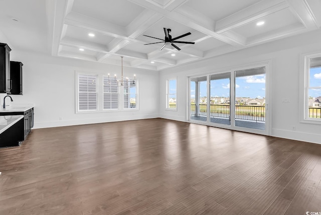 437 Saint Julian Ln, Myrtle Beach, SC 29579 - unfurnished living room featuring a ceiling fan, baseboards, a chandelier, dark wood-type flooring, and beamed ceiling