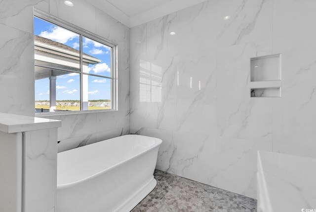 437 Saint Julian Ln, Myrtle Beach, SC 29579 - full bath with a freestanding tub and tile walls
