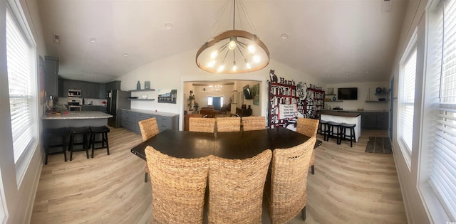 6205 Nixon St, North Myrtle Beach, SC 29582 - dining area featuring light wood finished floors and lofted ceiling