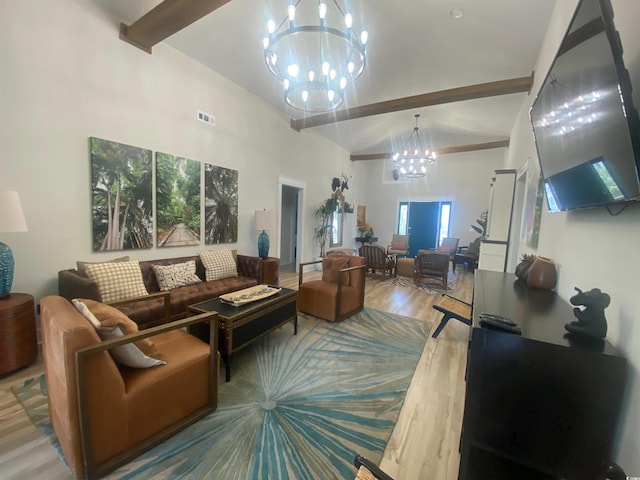6205 Nixon St, North Myrtle Beach, SC 29582 - living room with a chandelier, beam ceiling, wood finished floors, and high vaulted ceiling