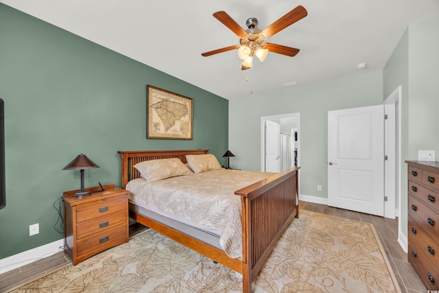 1009 Oak Marsh Ln, North Myrtle Beach, SC 29582 - bedroom featuring baseboards, wood finished floors, and ceiling fan