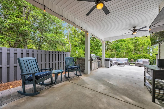1009 Oak Marsh Ln, North Myrtle Beach, SC 29582 - view of patio featuring outdoor lounge area, a ceiling fan, exterior kitchen, and fence