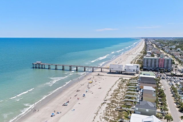 bird's eye view of waterfront with a beach