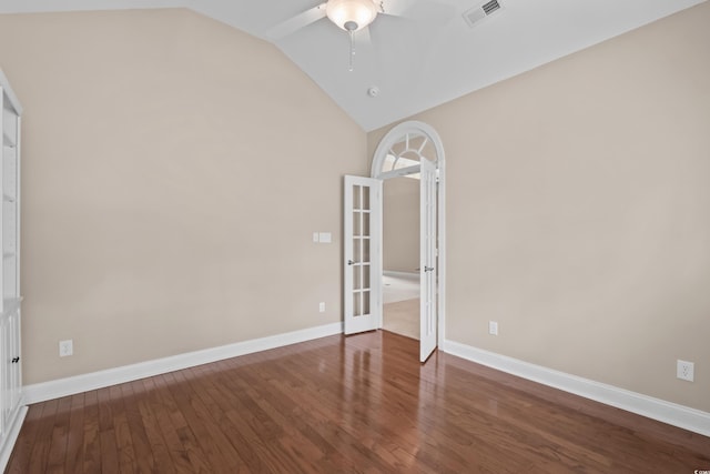 unfurnished room featuring ceiling fan, wood finished floors, baseboards, french doors, and high vaulted ceiling