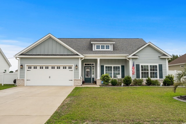 322 Canyon Dr, Conway, SC 29526 - craftsman inspired home featuring board and batten siding, roof with shingles, a garage, driveway, and brick siding