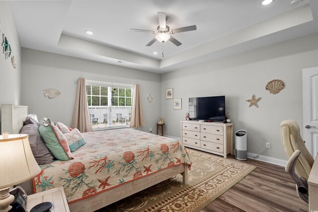 322 Canyon Dr, Conway, SC 29526 - bedroom with a raised ceiling, wood finished floors, recessed lighting, baseboards, and ceiling fan