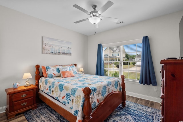 322 Canyon Dr, Conway, SC 29526 - bedroom featuring baseboards, wood finished floors, and a ceiling fan