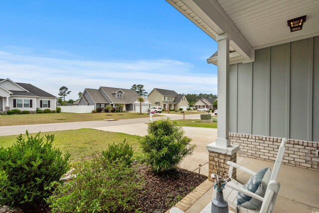 322 Canyon Dr, Conway, SC 29526 - view of patio with a residential view and a porch
