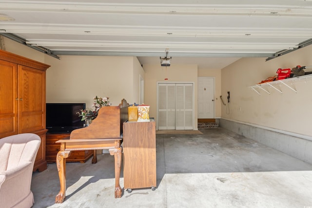 garage featuring a garage door opener