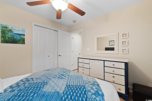 bedroom featuring a closet and a ceiling fan