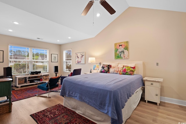 bedroom featuring light wood-style floors, baseboards, recessed lighting, a ceiling fan, and high vaulted ceiling